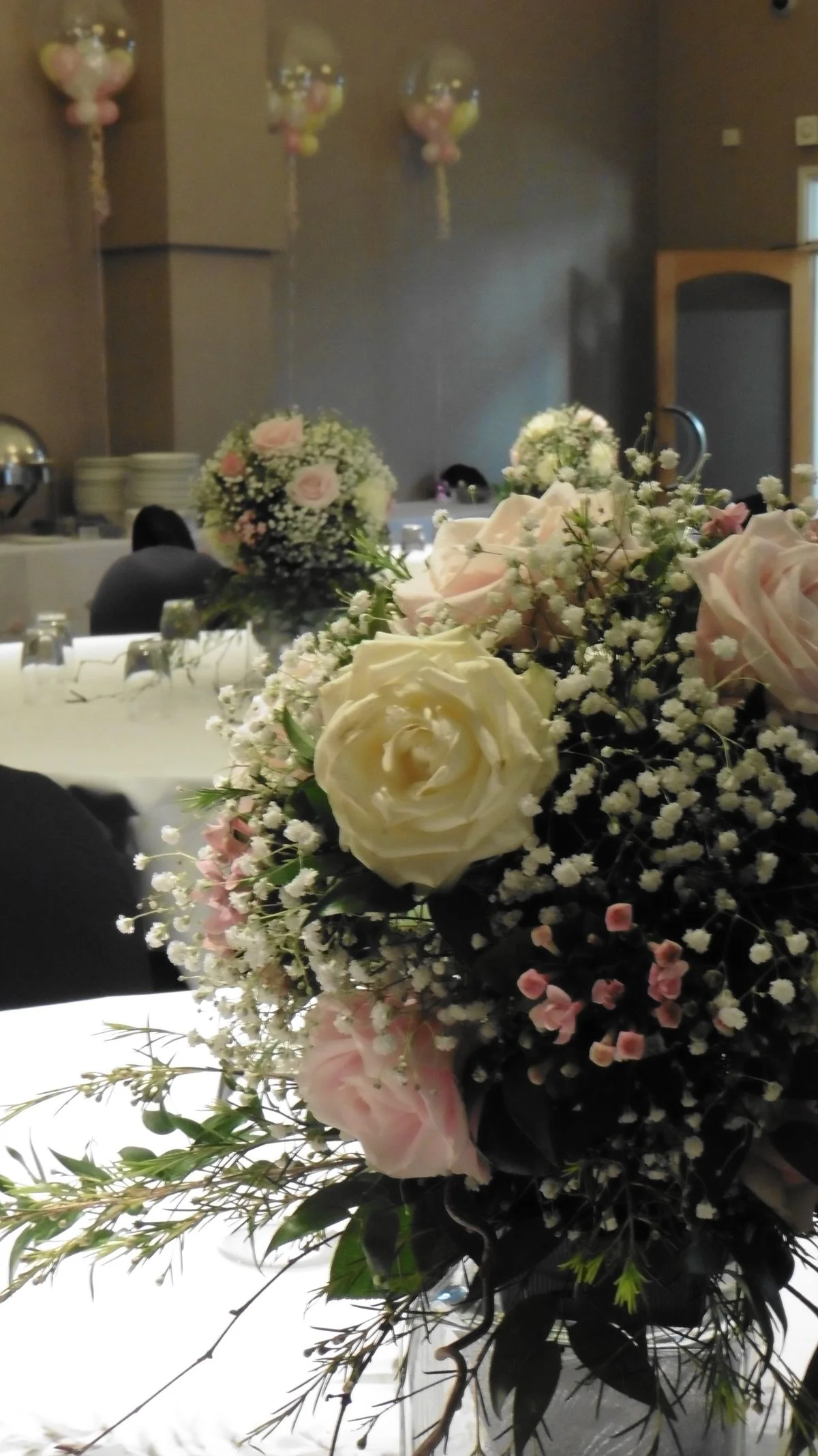baptism-flowers Table arrangement with roses