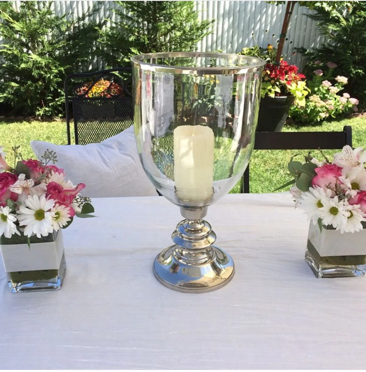 baptism-table Table with flowers and a candle holder